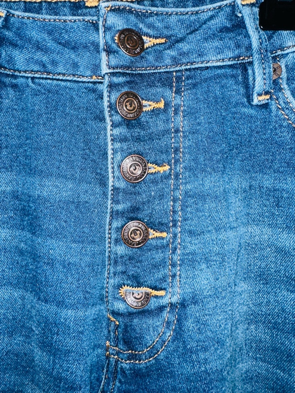 True Religion Ladies Blue Jeans w/ Gold Stitching, frayed at bottom with slits